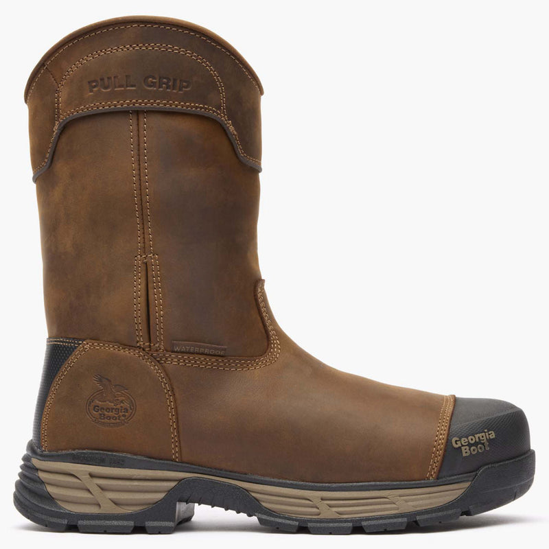 Brown work boot with pull grip feature on a white background