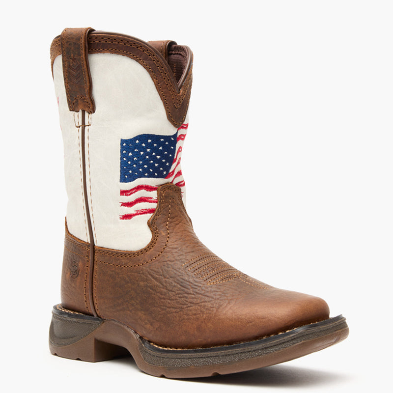 Brown and white kids western boot with American flag design on a grey background