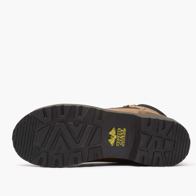 Close-up of a brown boot sole with a brand logo on a white background