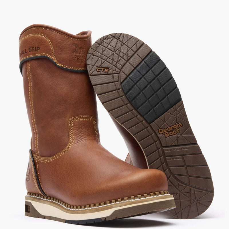 Brown leather boot with a close-up of the sole on a white background