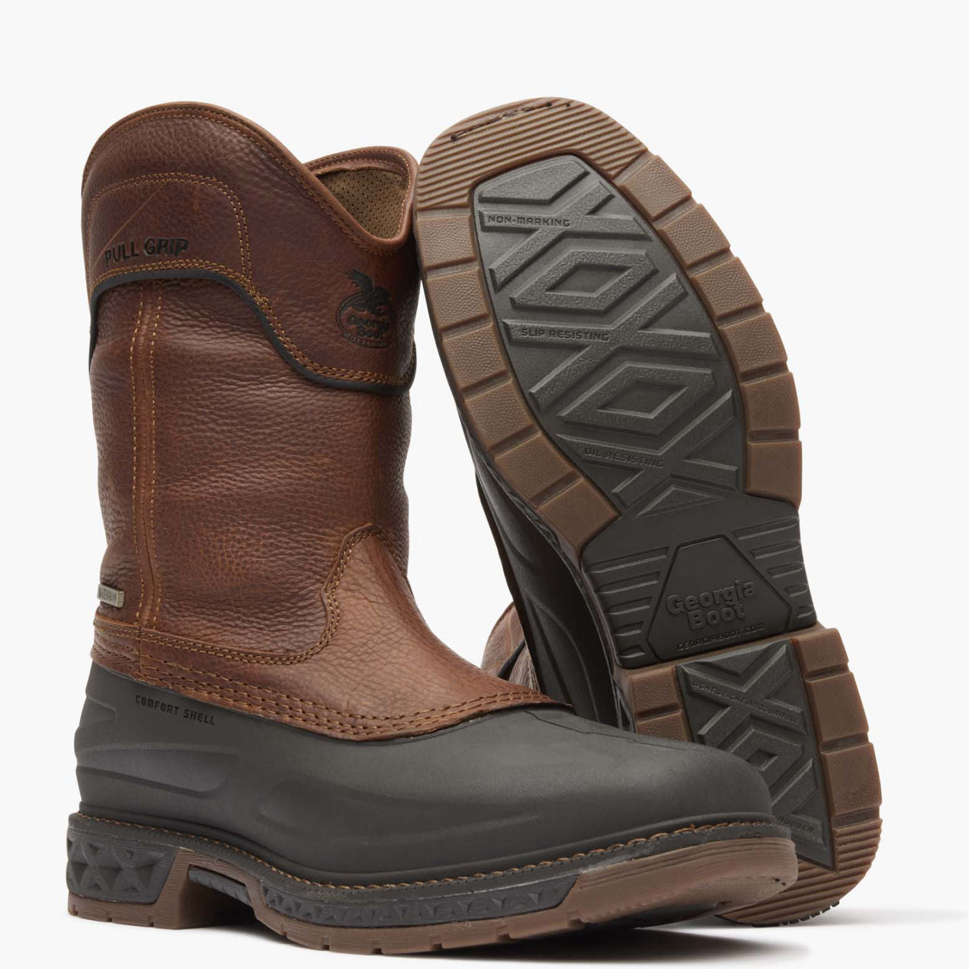 Brown work boots with a focus on sole texture and brand logo.