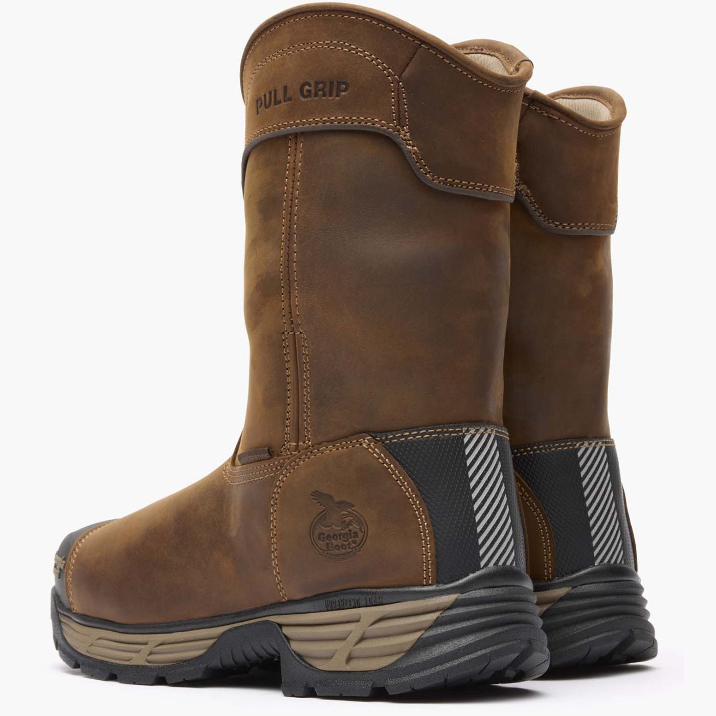 Pair of brown work boots with 'Full Grip' branding on a white background