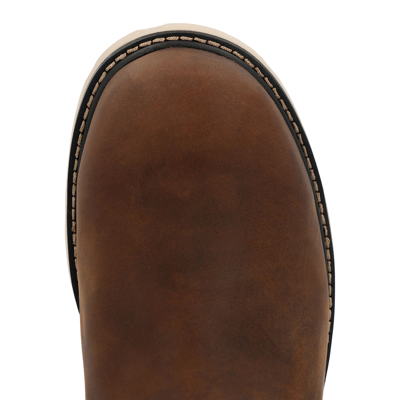Close-up of a brown leather boot sole on a white background