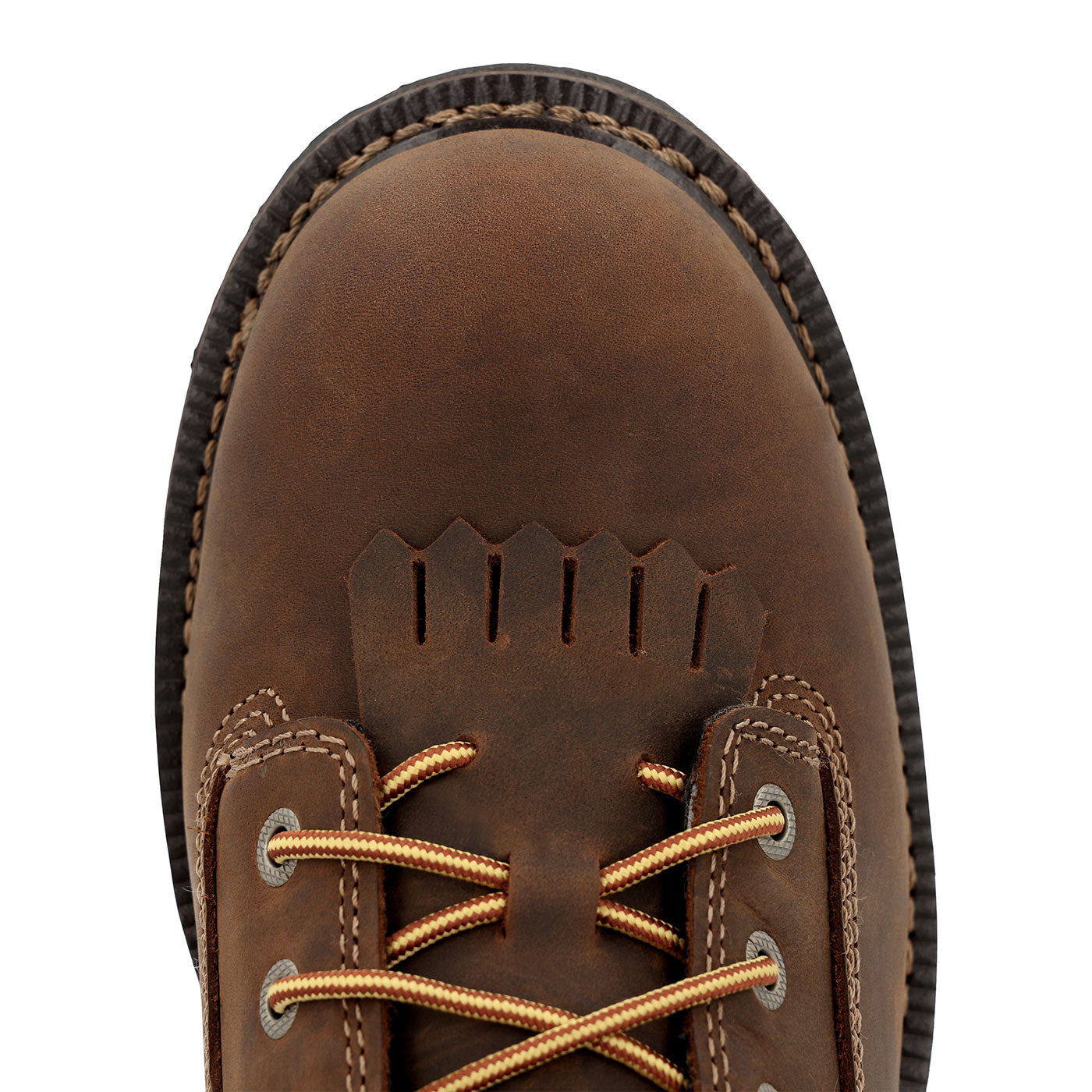 Close-up of a brown leather boot with gold laces on a white background