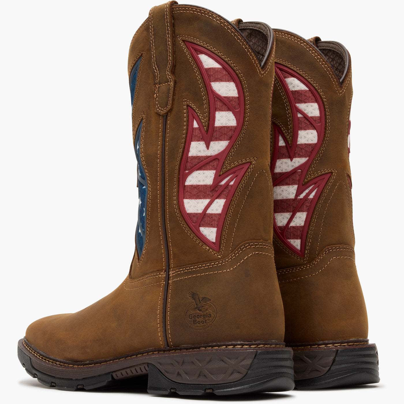 Brown cowboy boots with American flag design on a white background