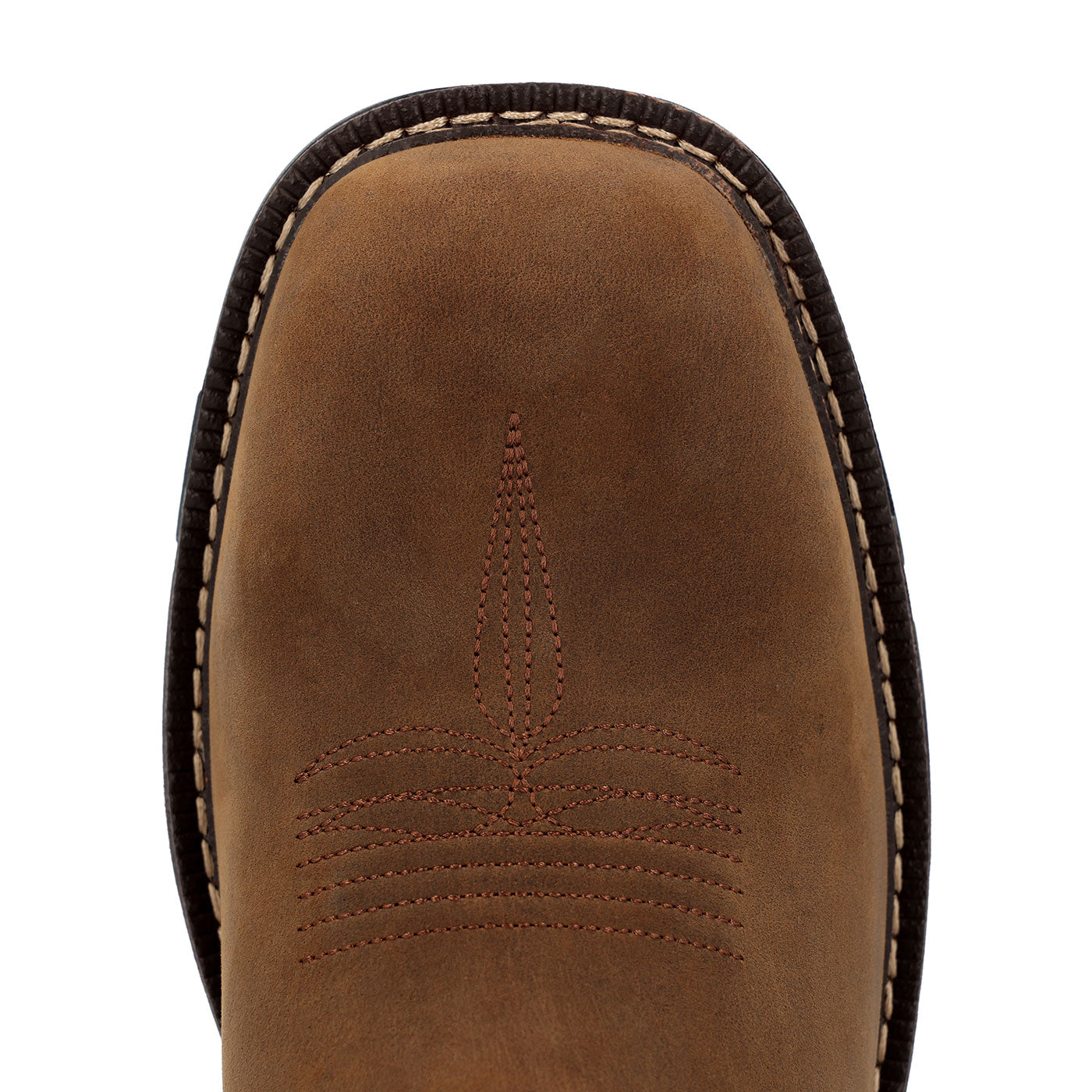Close-up of a brown leather boot sole with stitching detail on a white background