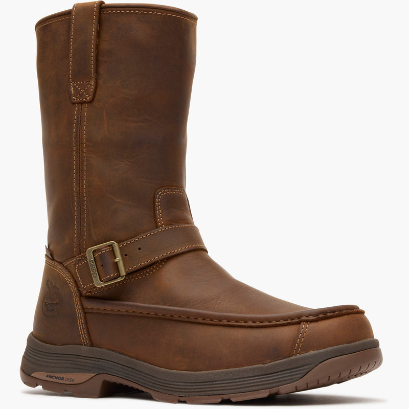 Brown leather boot with a buckle on a white background