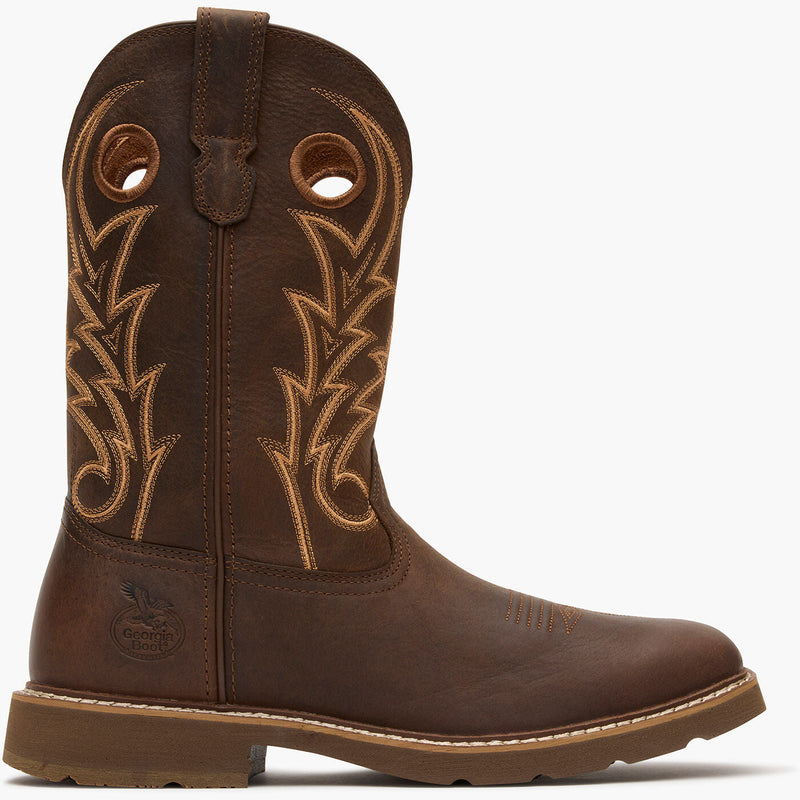 Brown cowboy boot with intricate stitching on a white background