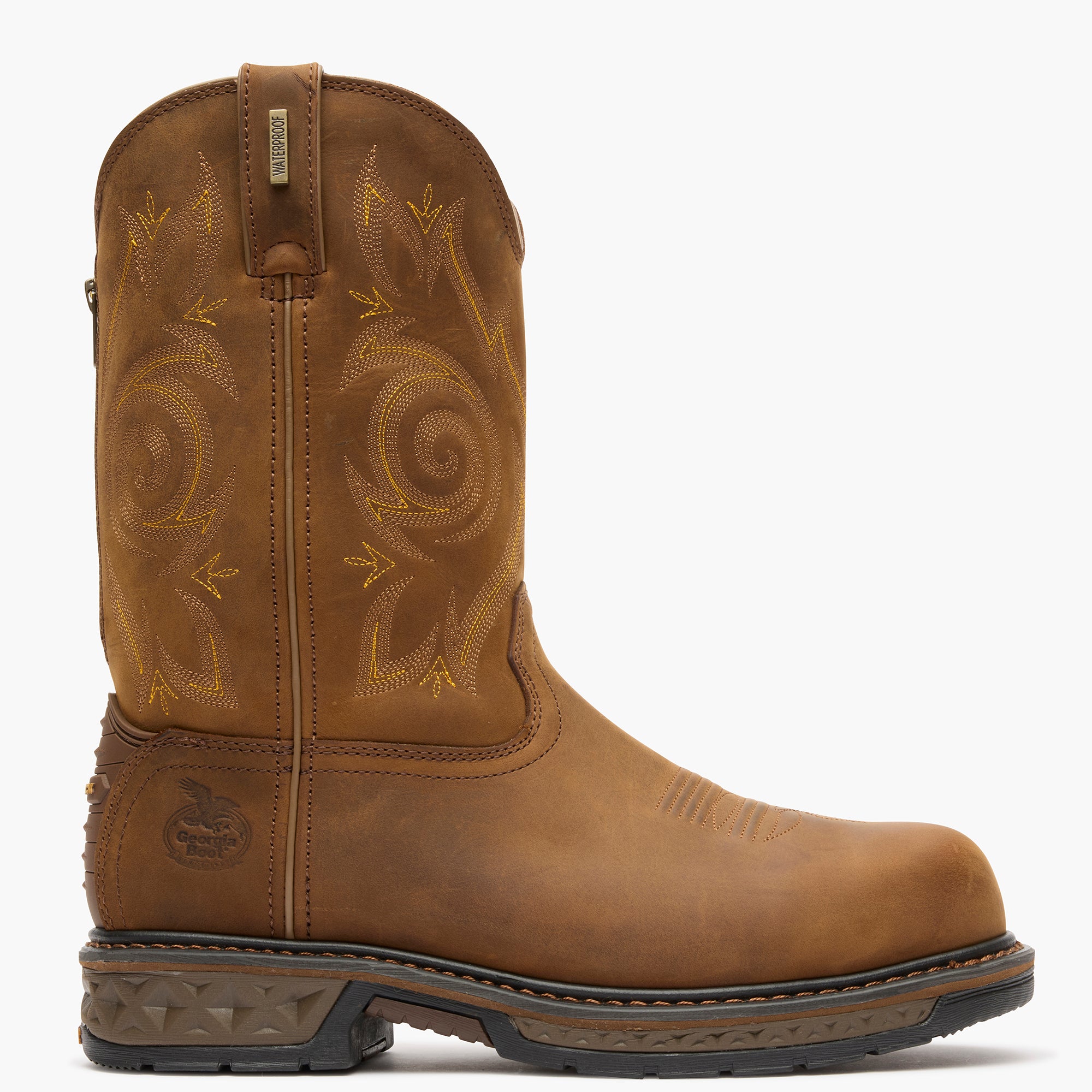 Brown cowboy boot with intricate embroidery on a white background
